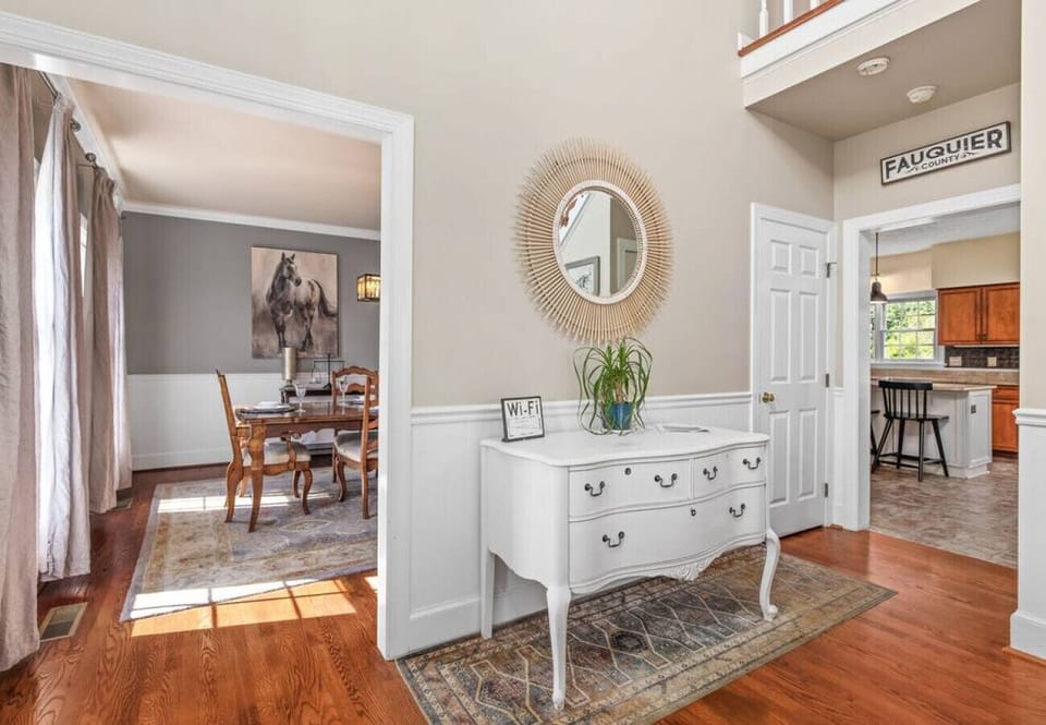 The foyer to the kitchen and the dining room