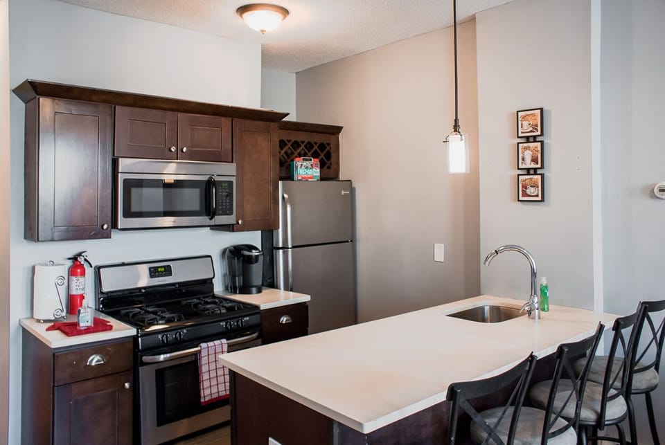 Kitchen with stove and other amenities