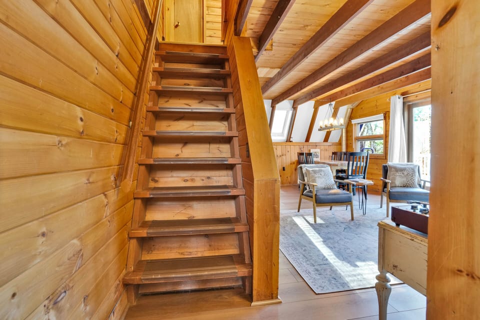 Stairs are extremely steep. There is a gate at the top for safety.