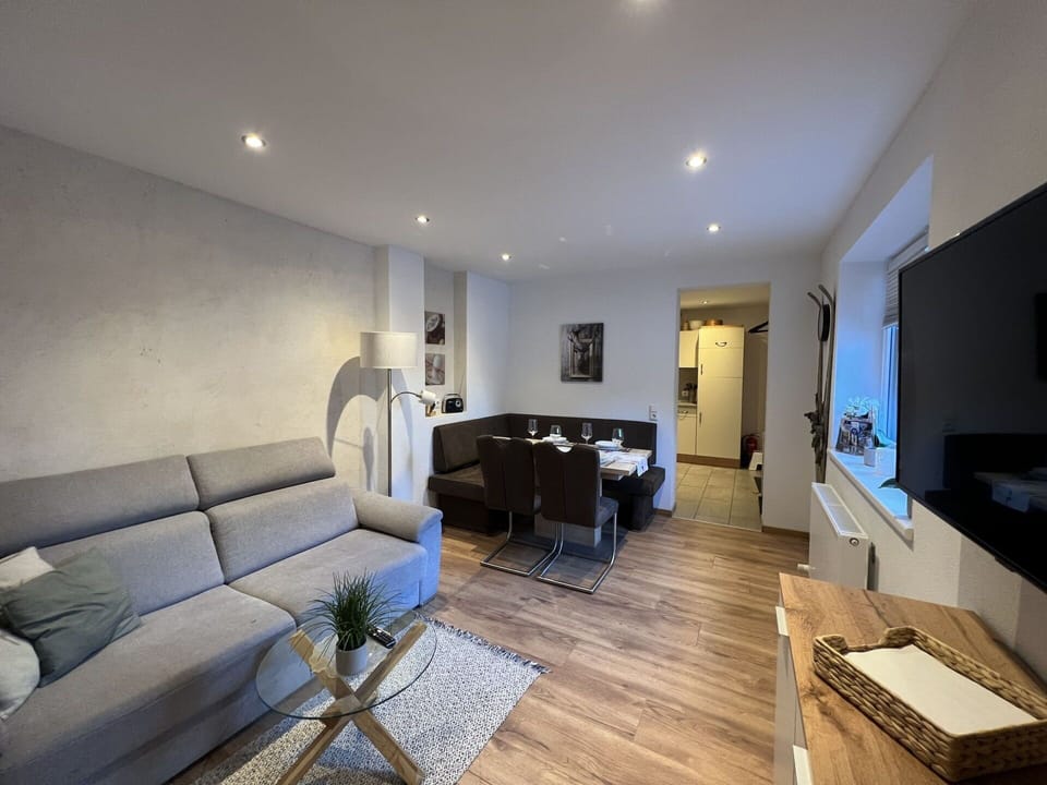 Furniture, Interior Design, Flooring, Couch, Room, Floor, Ceiling, Wood, Living Room, Table
