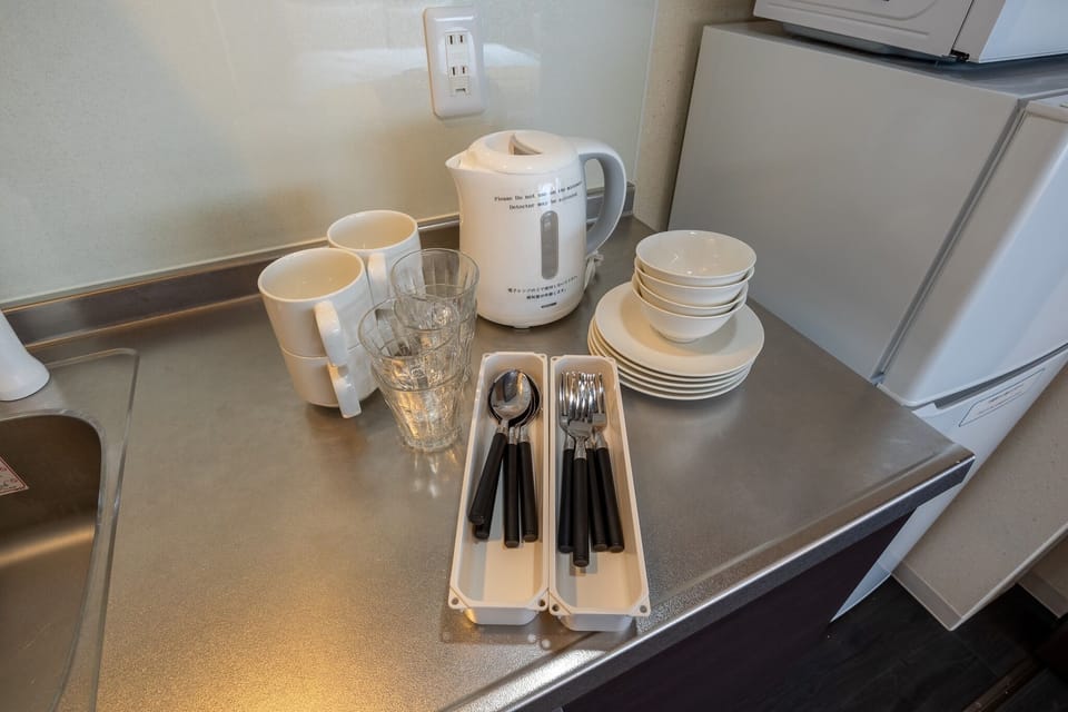 An electric kettle, tableware and cutlery are also available. Electric kettle, tableware and cutlery are also available.