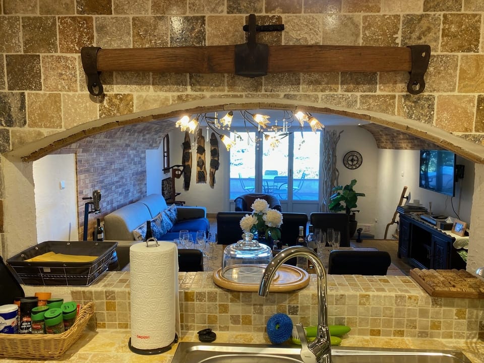 Visit with friends while busy in the kitchen, see 2nd terrace from French doors