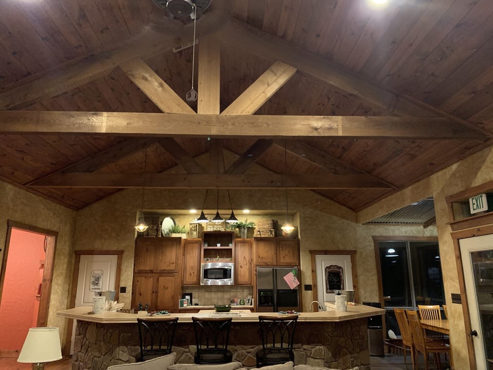 Kitchen has two dining areas and a bar with seating for 18