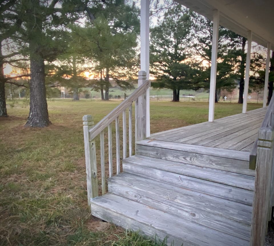 Side stairs to the front porch.