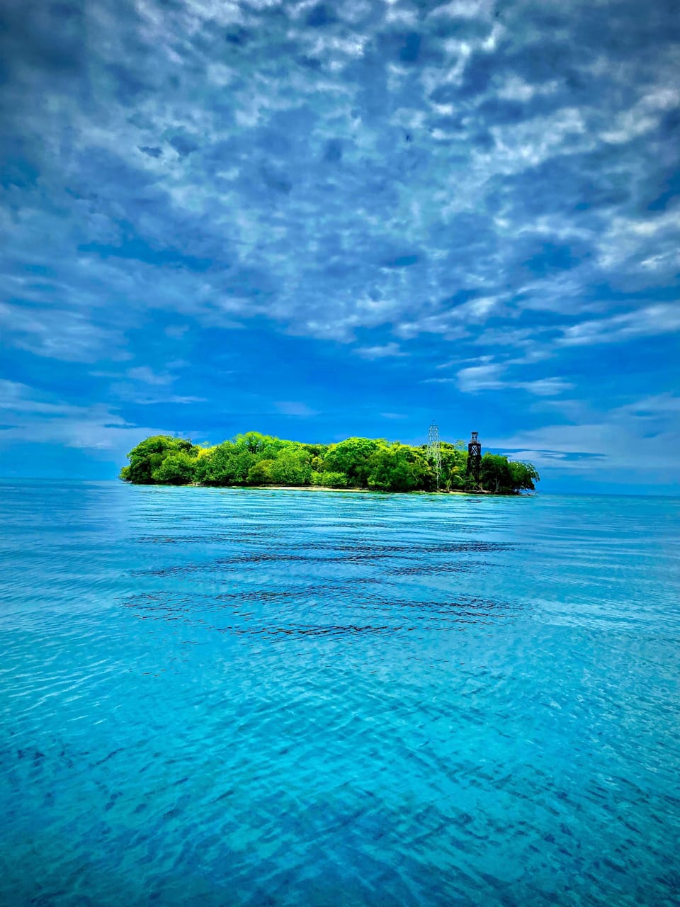 Snake Caye, one of many private islands just 30 mins away.   