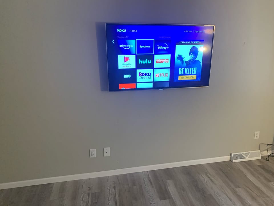 HDTVs in living room & bedrooms equipped with Roku streaming & Spectrum cable
