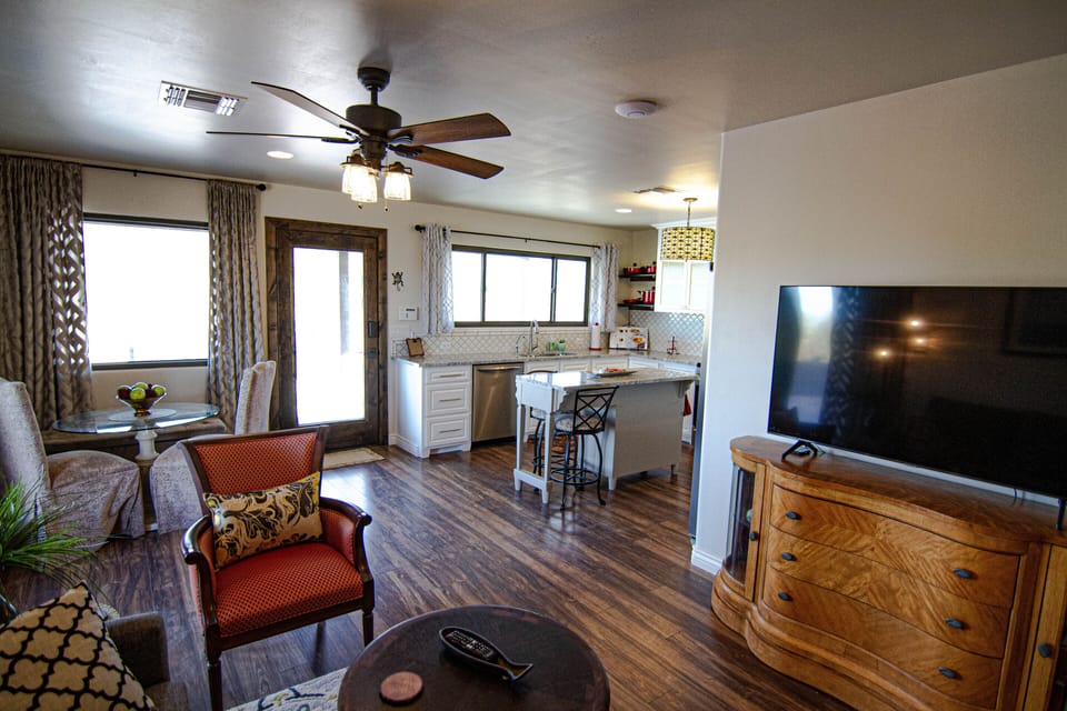 Open floor plan with lots of seating. New 55" TV and a variety of books to read