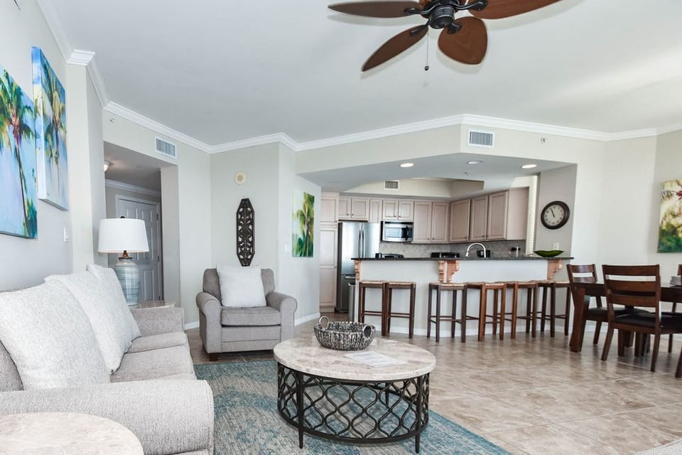 Spacious living room with full Gulf-front windows