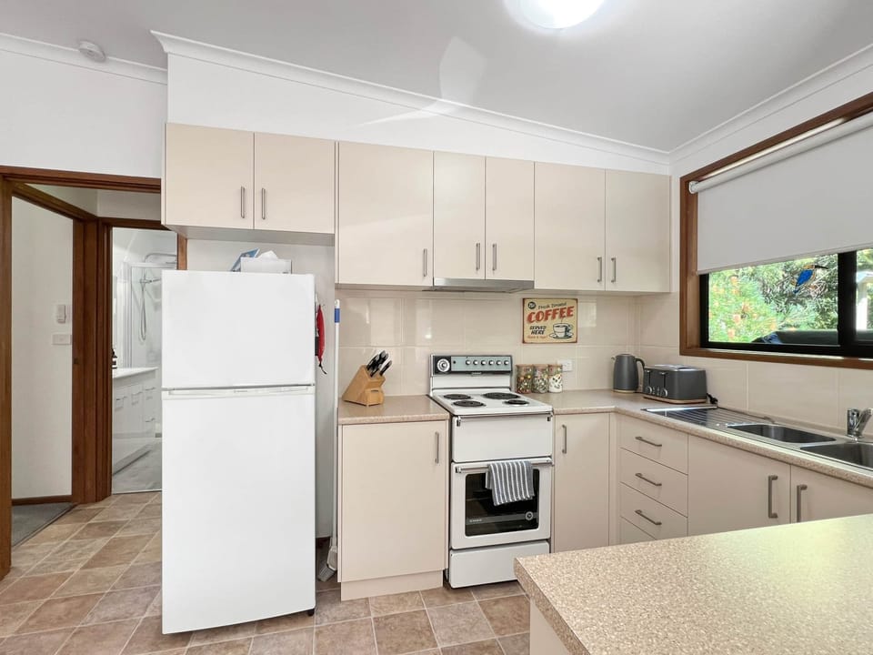 Discover a fully-equipped kitchen, stocked with all essentials, ensuring a seamless experience.
