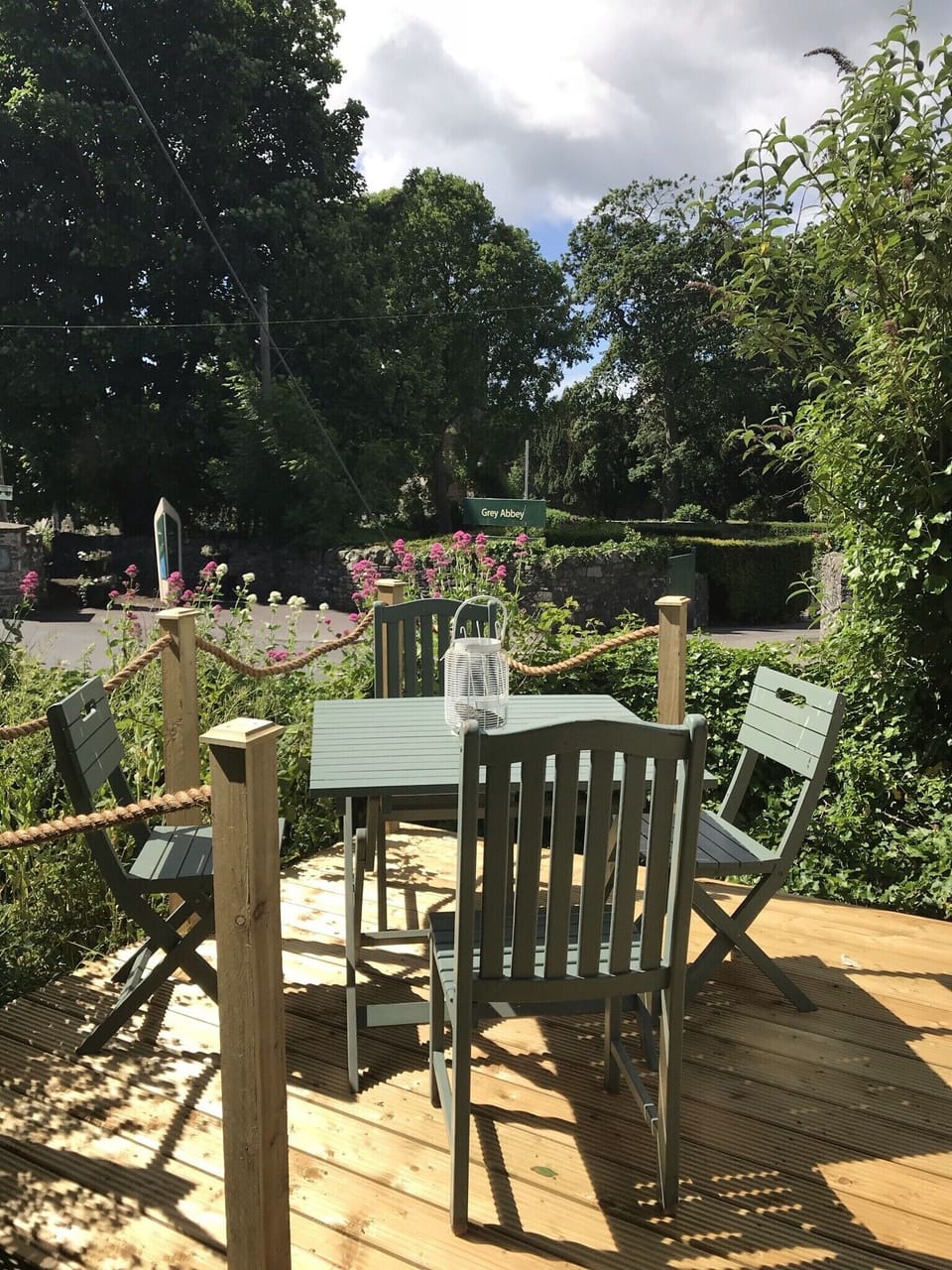Decked area with table & chairs so you can enjoy views of the Abbey