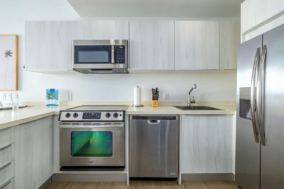 Your fully equipped kitchen awaits with stainless steel appliances, ample counter space, and everything you need to prepare meals just the way you like them.
