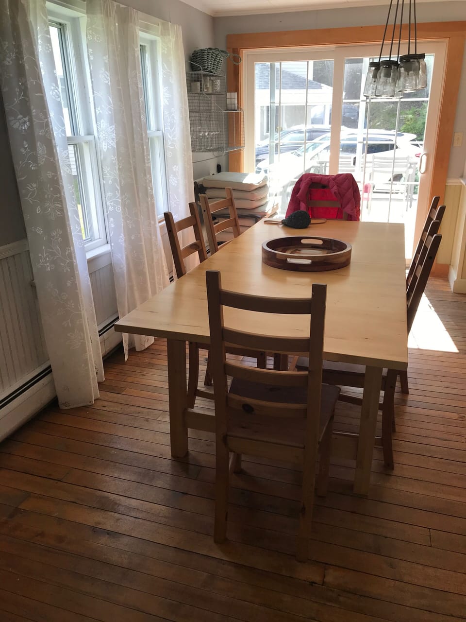 The dining room has a table for 6 and a workspace