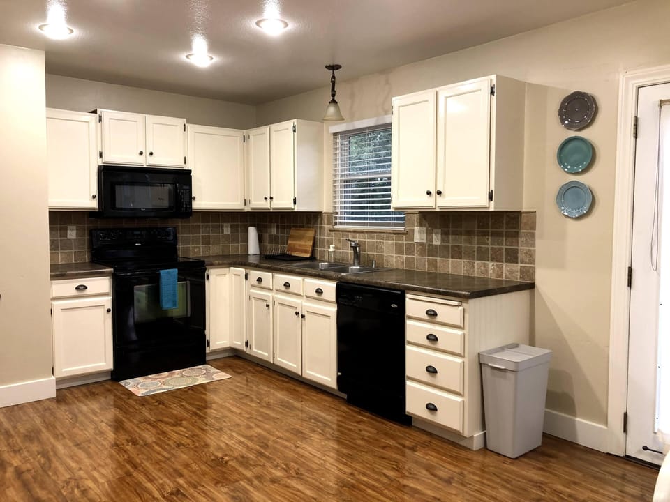 Fully equipped kitchen for a full meal or snacks! Open concept feels so spacious