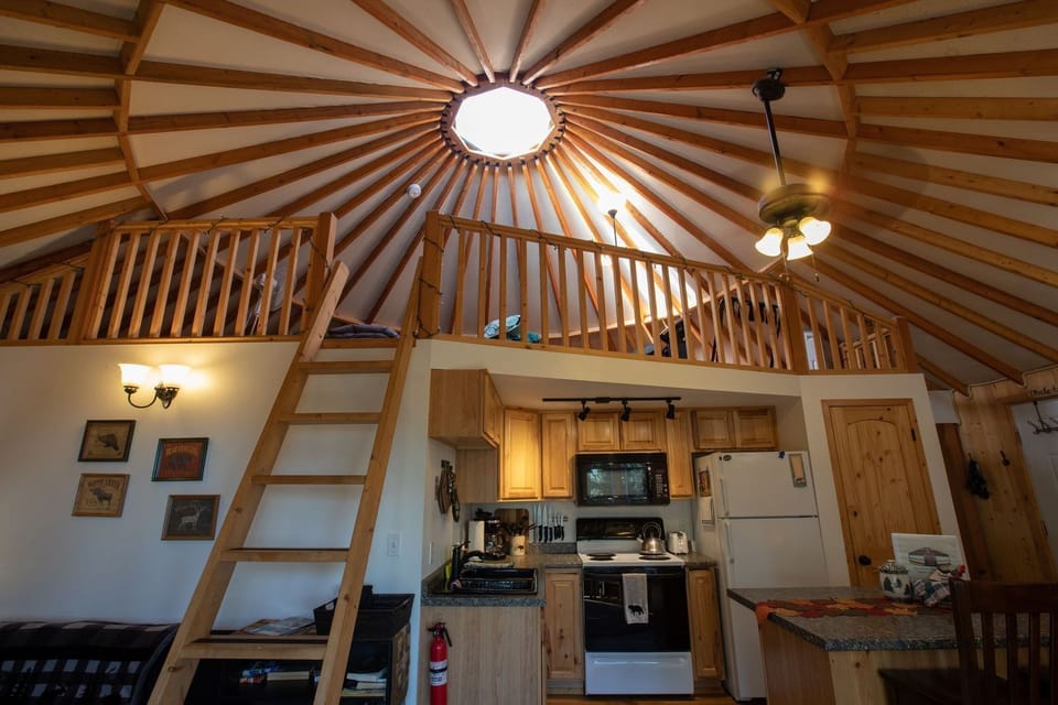 Entrance view and movable ladder to loft