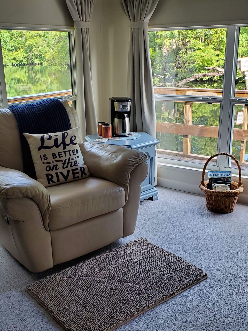 Swivel rocker recliner, relax, unwind and watch the river flow by.