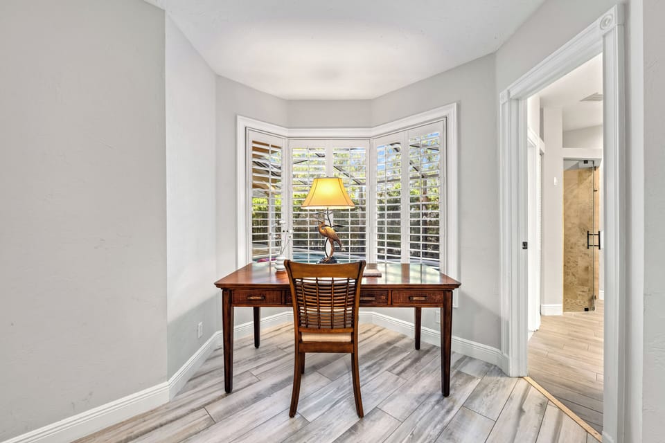 In bedroom 1 you'll find focus comes easy at this peaceful desk with a view.