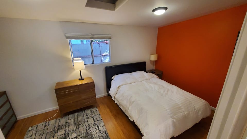 Large Bedroom with a comfortable queen bed. 