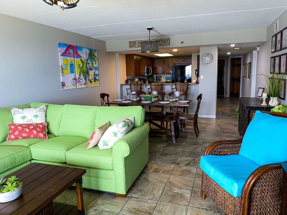 Living room: balcony, HDTV, and Ocean views. Enough room for everyone to relax. 