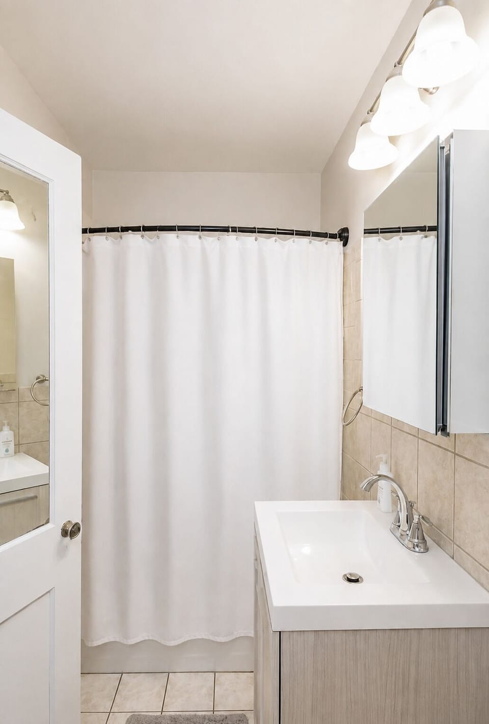 Full shower and tub in bathroom
