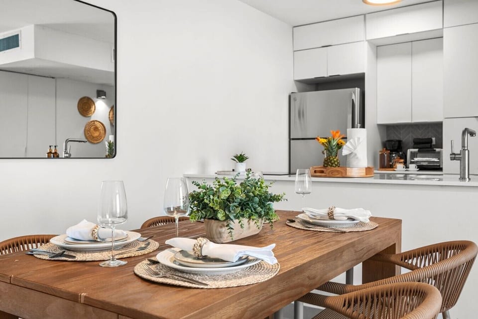 A bright, modern dinning area with comfortable seating for the whole group