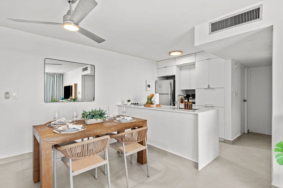 A bright, modern dinning area with comfortable seating for the whole group