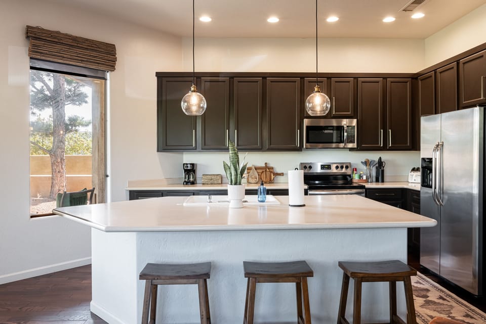 Fully Equipped Kitchen with  Island Seating for Three