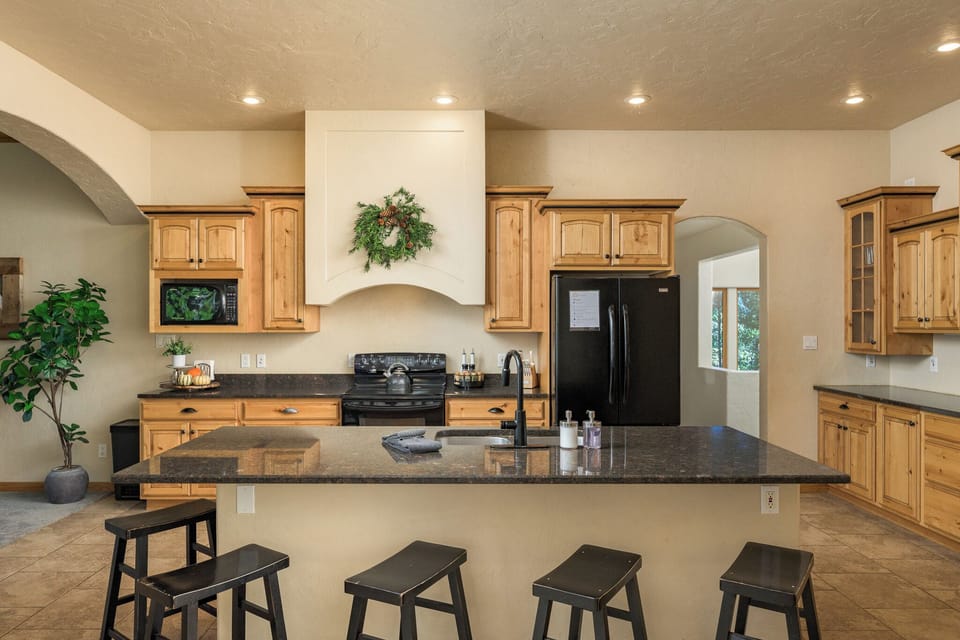 Fully Equipped Kitchen for Culinary Creations: Create a feast in the well-appointed kitchen, stocked with everything needed for bountiful, home-cooked meals.