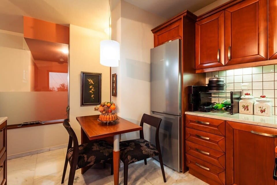 Experience the charm of a small sitting area in the kitchen