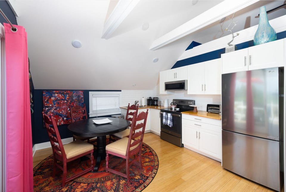 Large well appointed kitchen with dining area.