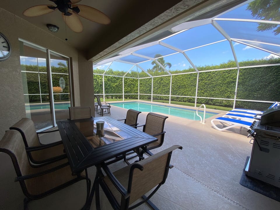 covered lanai out to the pool