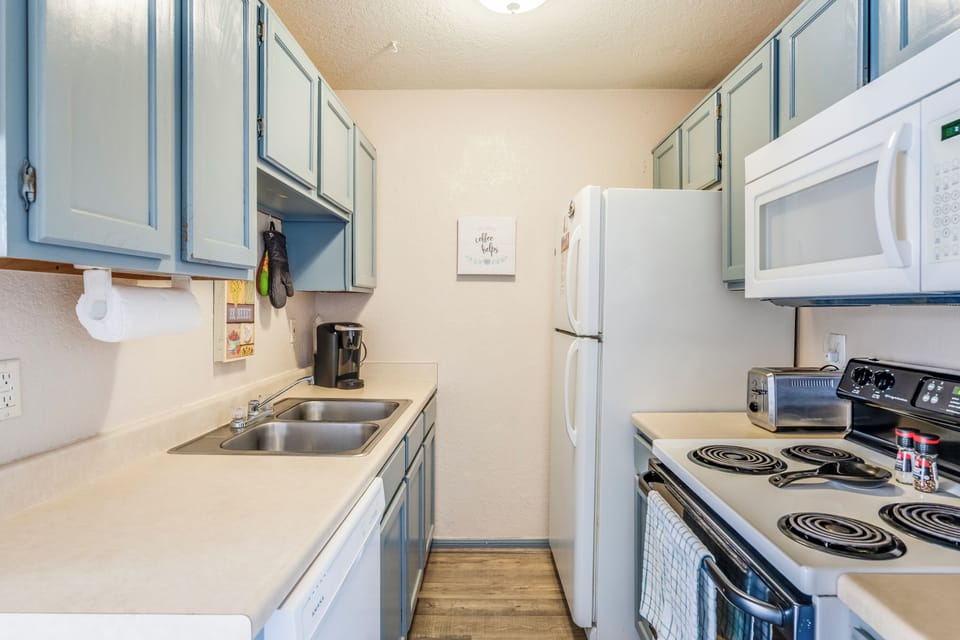 Your fully equipped kitchen offers everything needed for home-cooked meals, with modern appliances and ample counter space for meal prep.