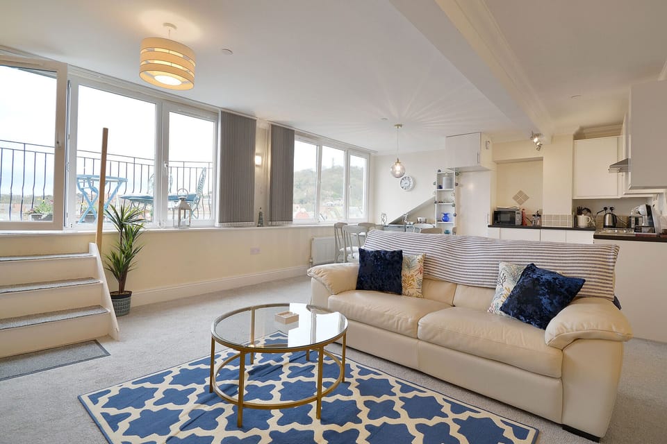 Spacious living room with large picture windows