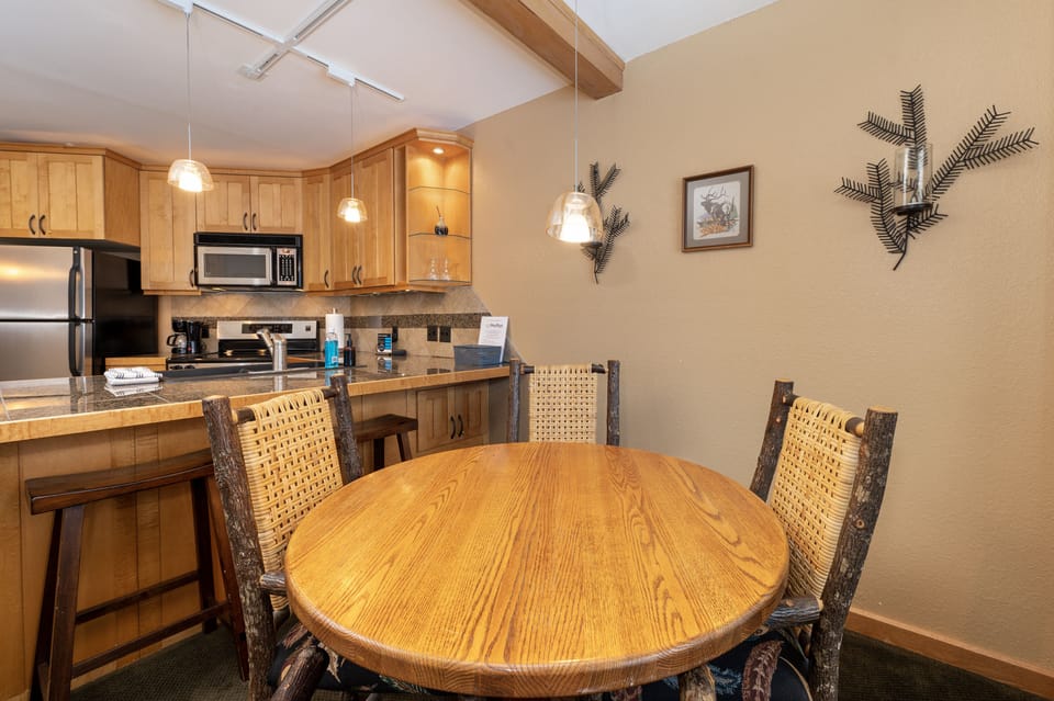 a round dining table for four, for your dine-in meals or get a good card game going!