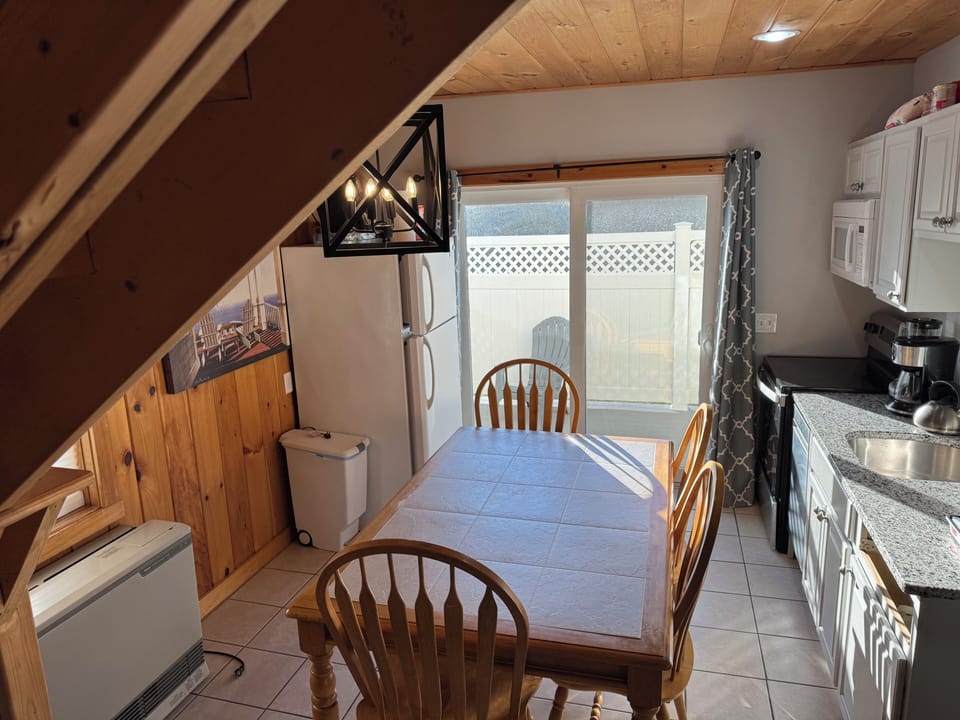 Kitchen seamlessly leading out onto the porch. 