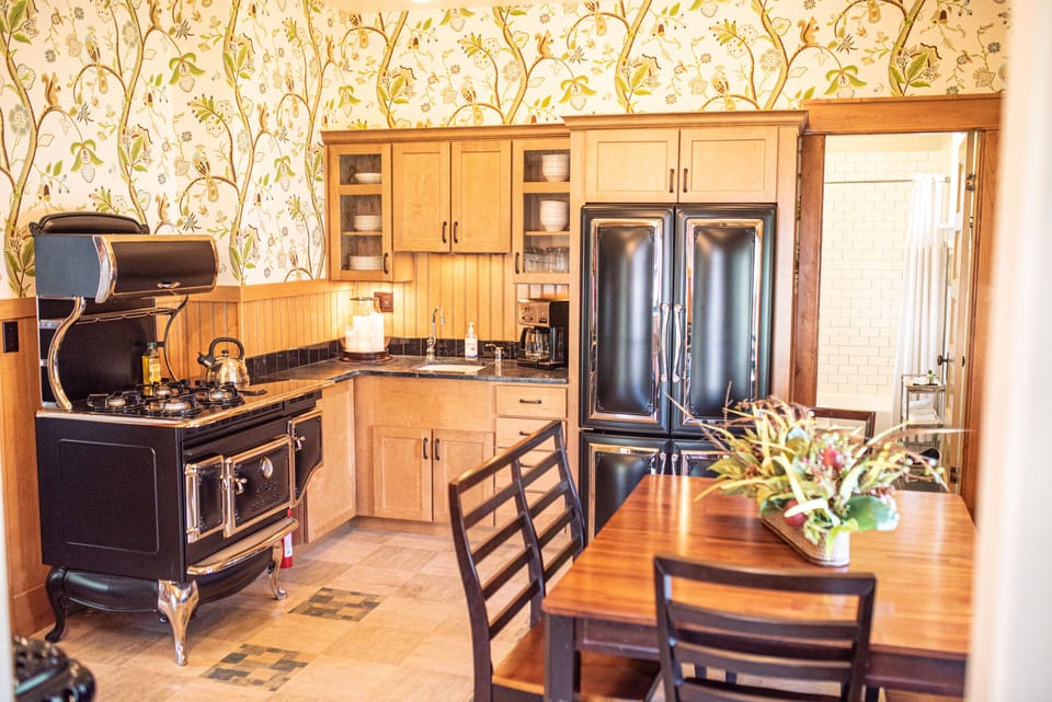 Kitchen and Dining Table.  Fun vintage looking new appliances.