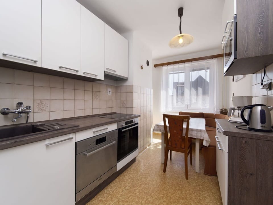 Cabinetry, Countertop, Kitchen Stove, Kitchen Appliance, Home Appliance, Kitchen, Wood, Lighting, Gas Stove, Interior Design