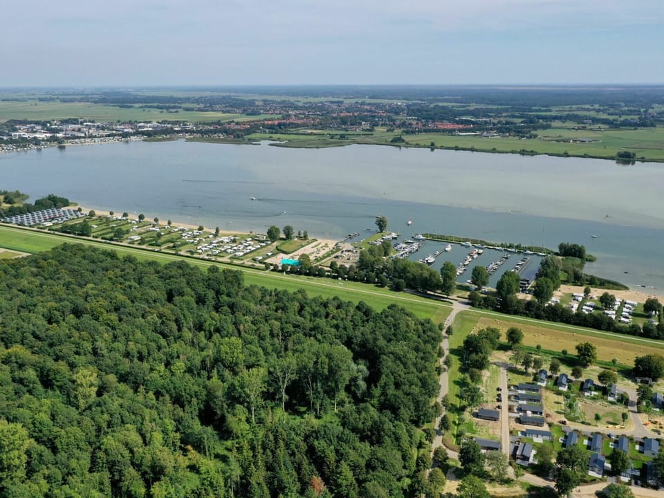 Water, Sky, Water Resources, Natural Landscape, Tree, Land Lot, Urban Design, Body Of Water, Coastal And Oceanic Landforms, Lake