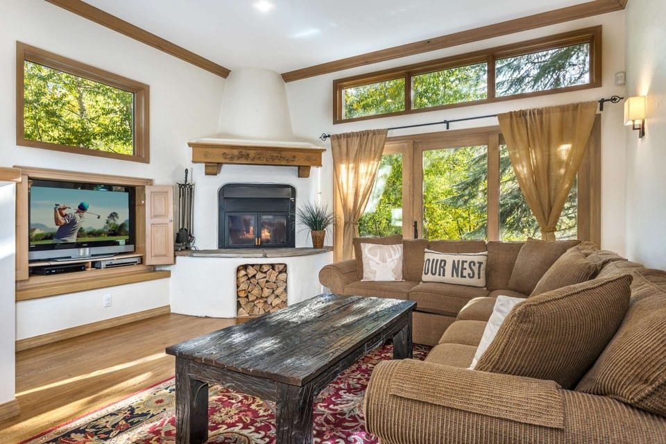 Relax on the plush sectional and watch your favorite movie on the flat-screen TV.