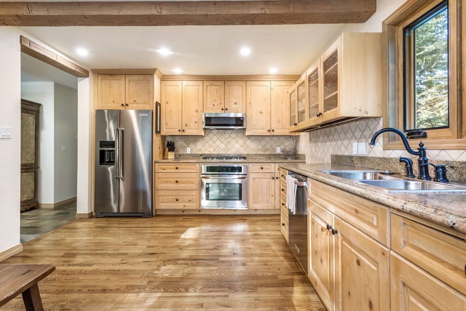 Gorgeous granite countertops provide plenty of workspace for the chef.