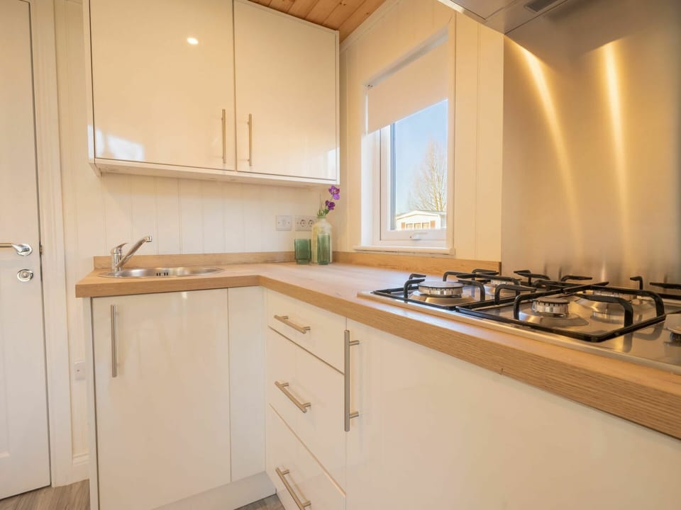 Property, Room, Countertop, Sink, Kitchen, Furniture, Interior Design, Cabinetry, Building, House
