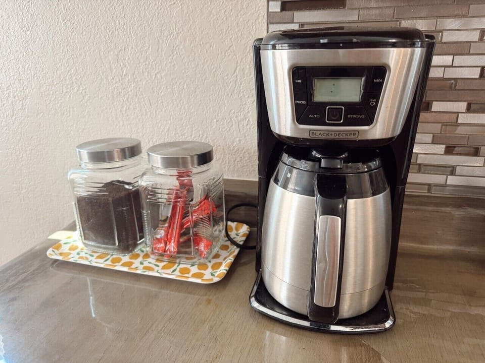 Best part of the day!  Enjoy drip coffee with sugar, creamer and Torani syrup