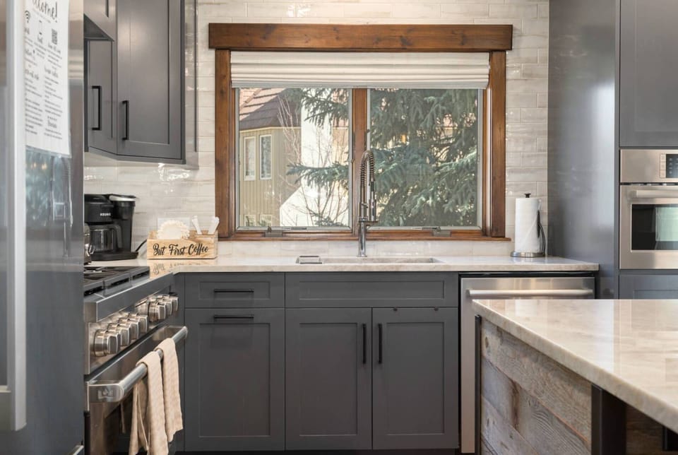 Kitchen Features, Gas Range, Microwave, Refrigerator with Ice and Water Dispenser, Keurig and Drip Coffee Maker, Tea Kettle, Crock Pot and Hand Mixer.