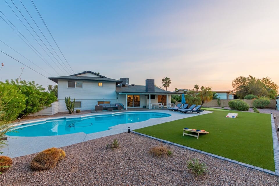 amazing back yard -- pool can be heated upon request (inquire for details) - fire pit, turf area for yard games & putting green