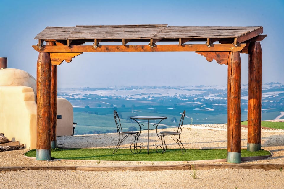 Pergola seating with unforgettable valley views.