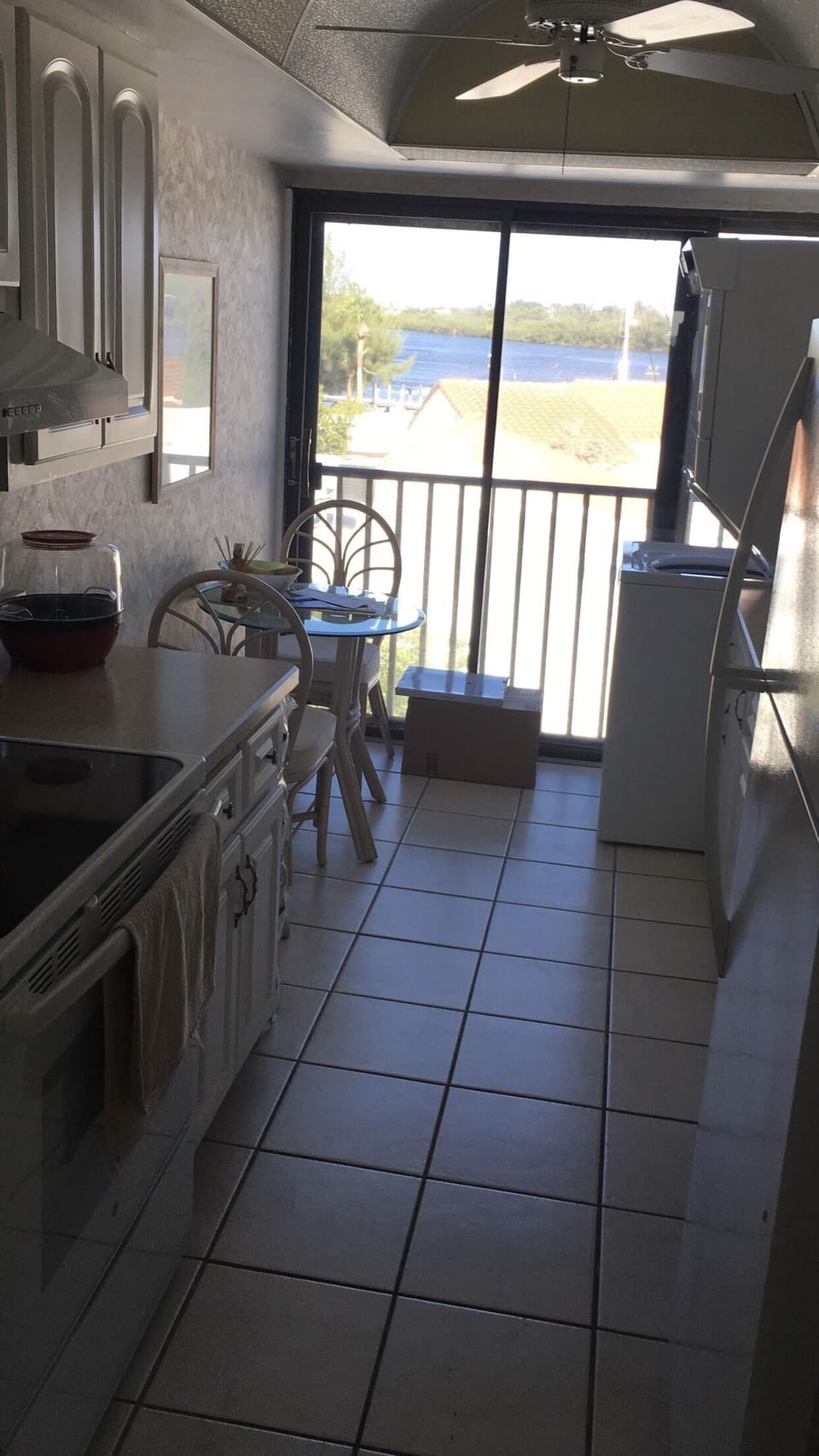 Kitchen with view of boats on inter coastal 