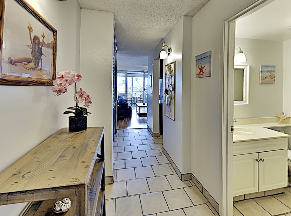 This Beachy and Hawaiian decorated condo will make you feel vacation vibes the moment you enter.