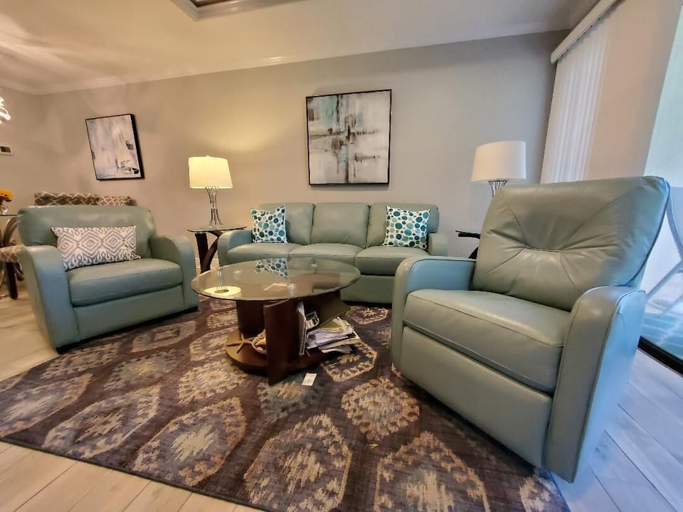 Comfortable living room with pull out coach and lounge chair 