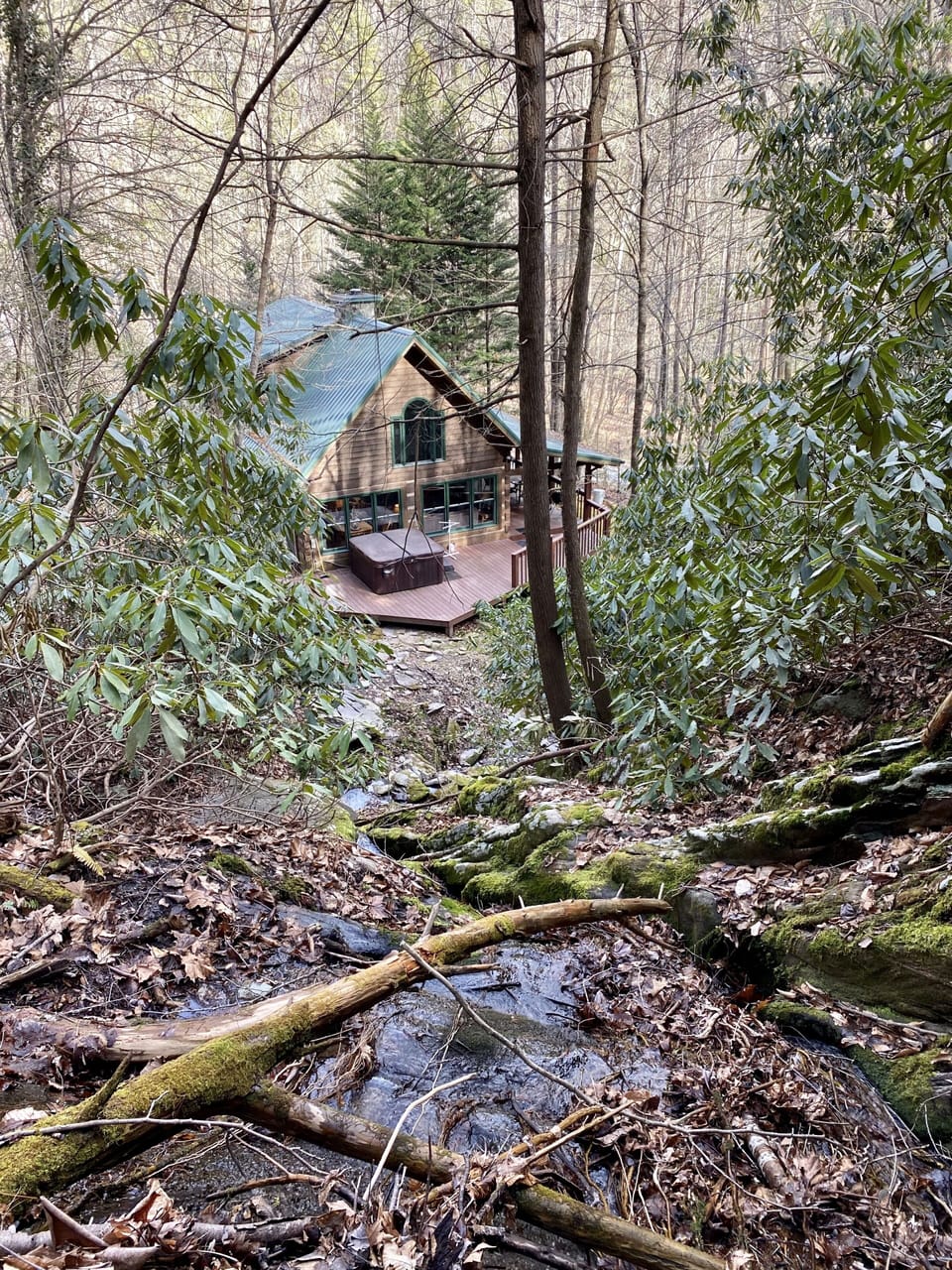The cabin viewed from above the waterfall.