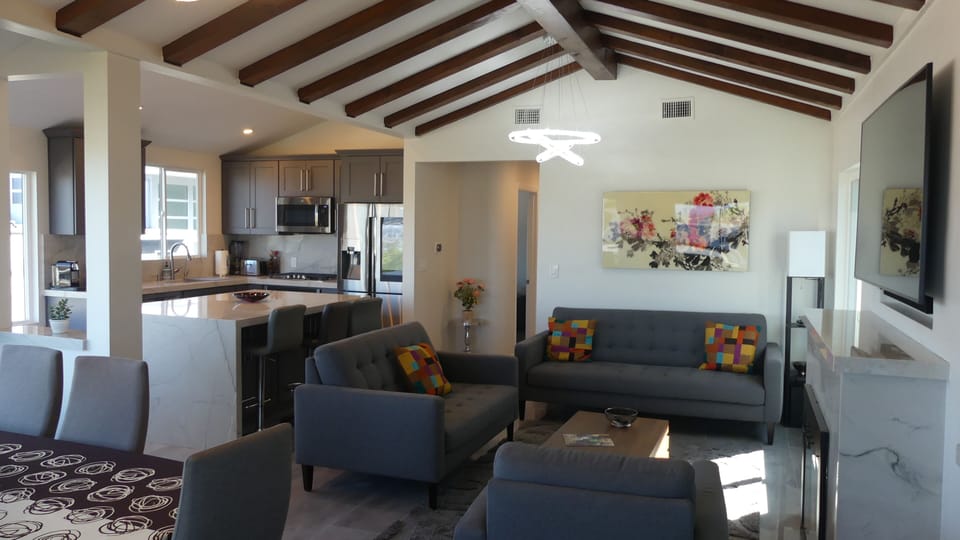 Modern Living room with Bay View , Bar and Dining room with Bay View  with HDTV 