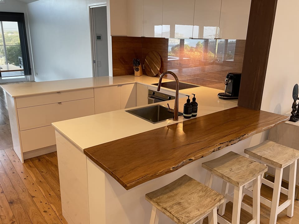 Kitchen opens to back family room